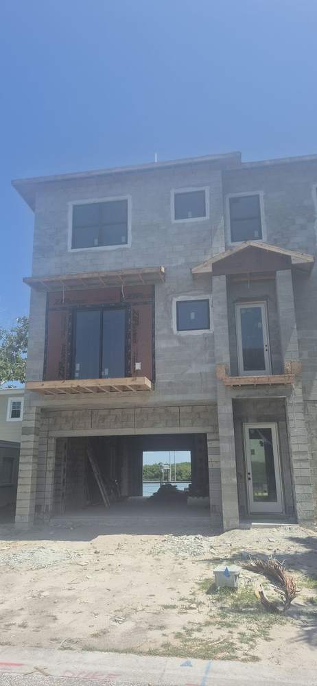 MMATGC CMU block work — Three-story block front elevation