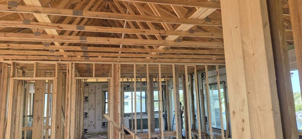 MMATGC framing work — Elevated floor framing over waterfront lanai